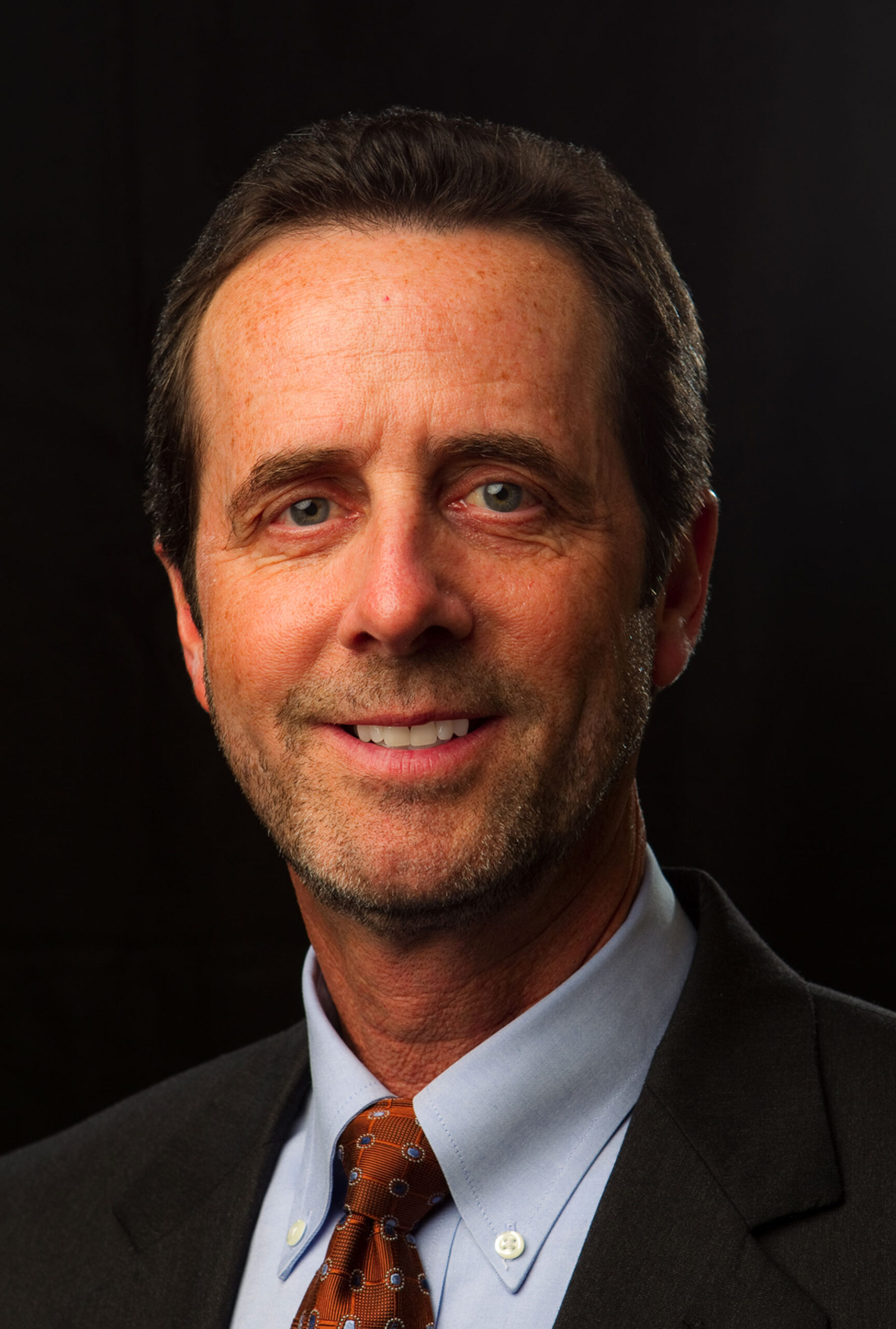 Headshot photograph of Michael Jones, a partner with full-service law firm Matthews &amp; Jones in Destin, Florida.