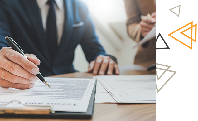 attorney putting pen to paper