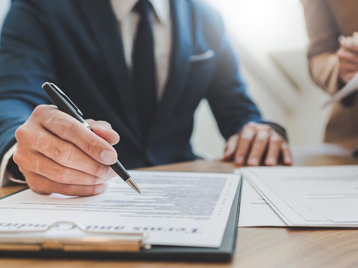 Lawyer and a client talking together.