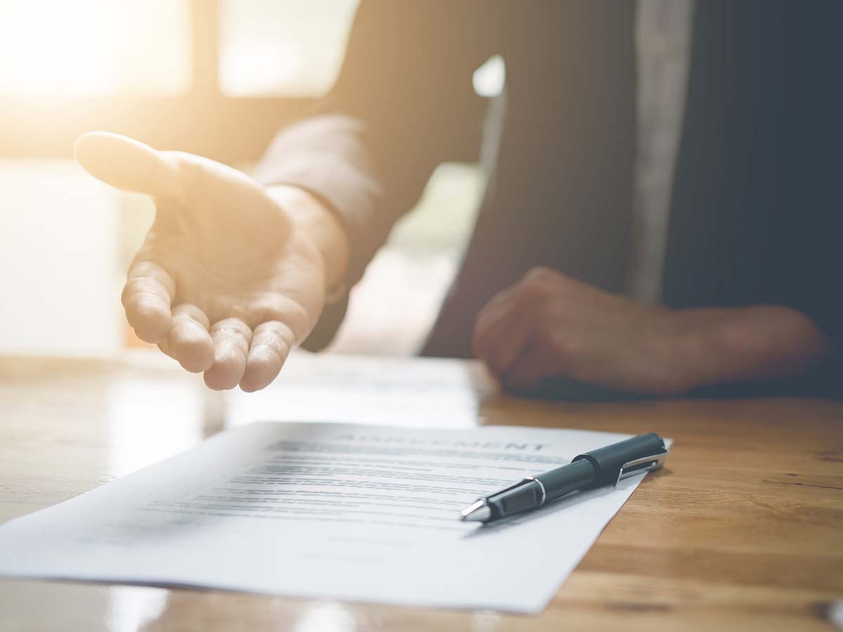 A lawyer outstretching his hand