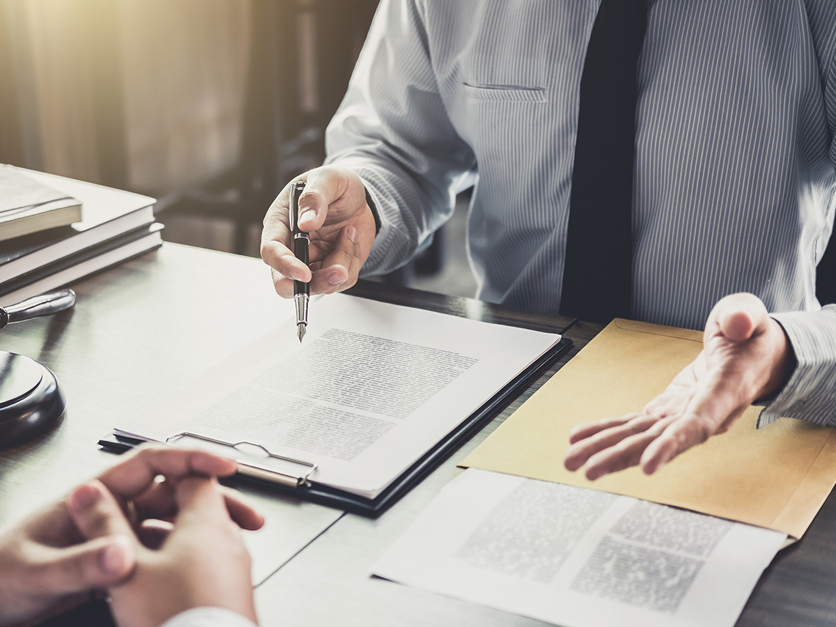 Lawyers discussing penalties of case