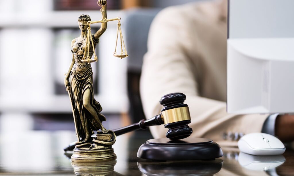 gavel and scales of justice on lawyer's desk