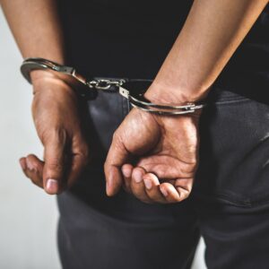 Closeup of person in handcuffs