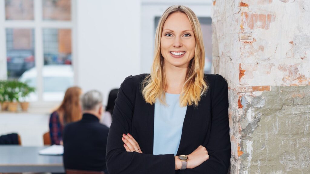 Person in a suit smiling