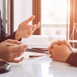 Lawyer speaking with client