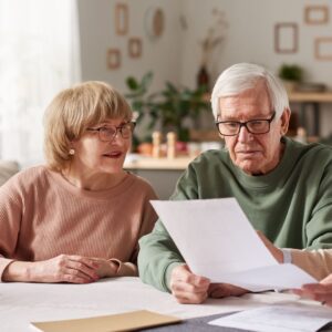 older couple looking at will
