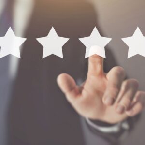 person touching one of five stars