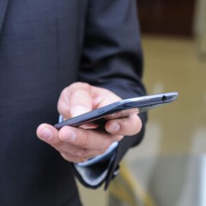 person touching cellphone