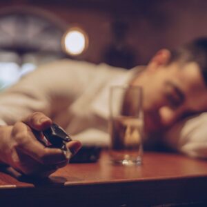 Drunk man with car keys in hand