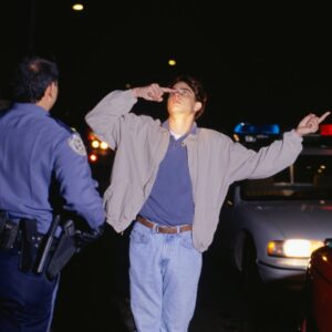 a person taking a field sobriety test