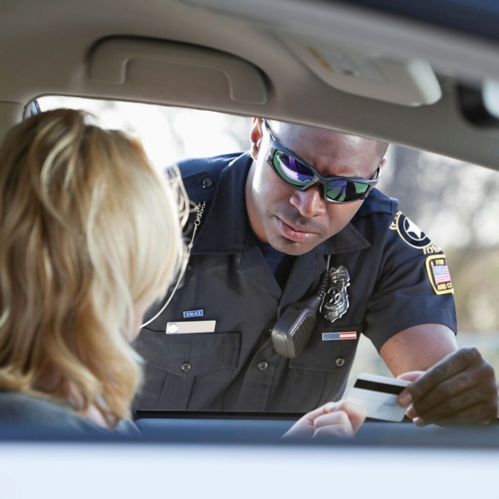 woman being pulled over by police