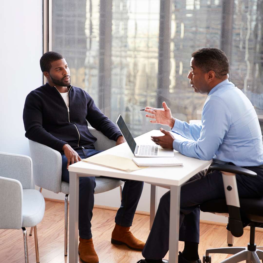 man meeting with lawyer