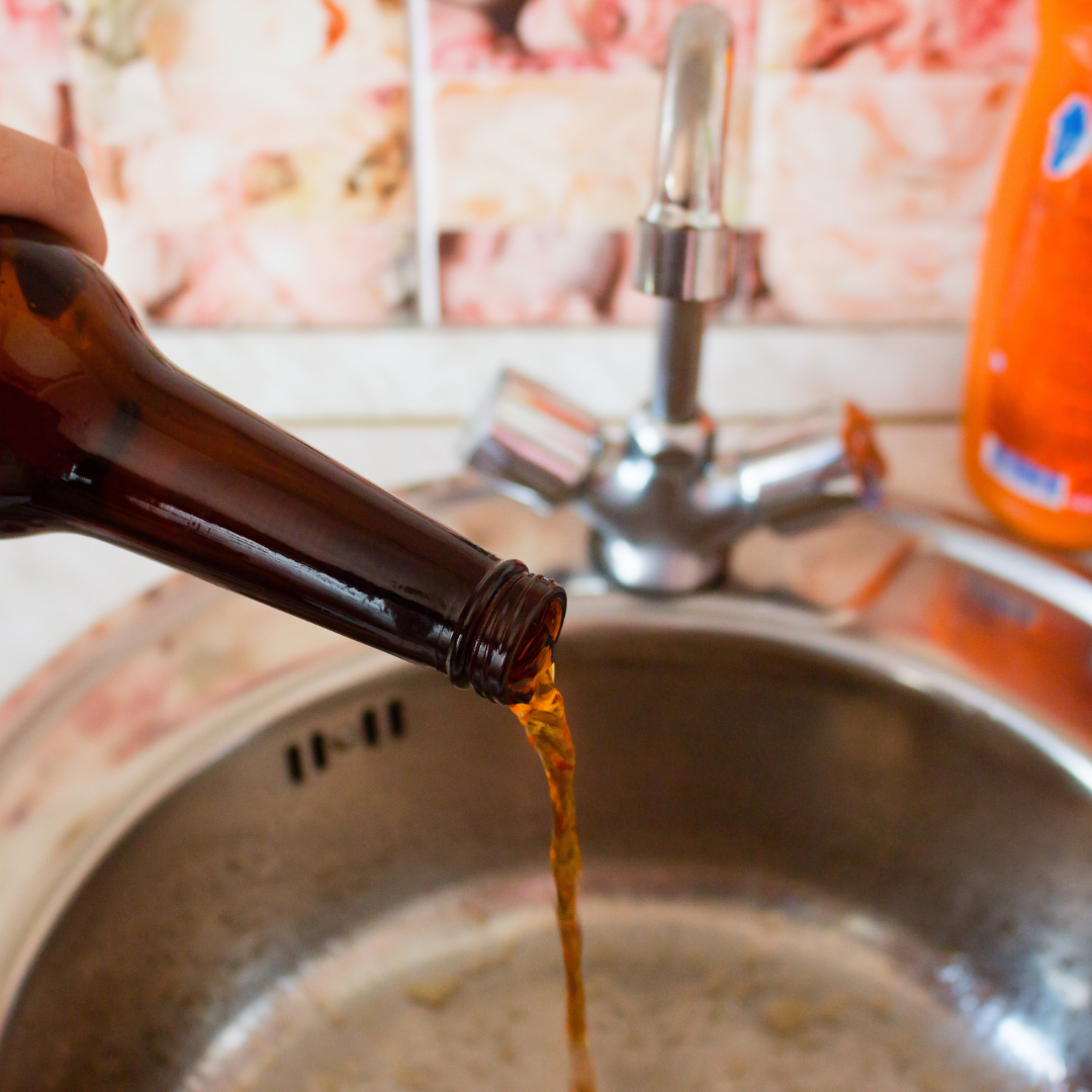 pouring beer down sink