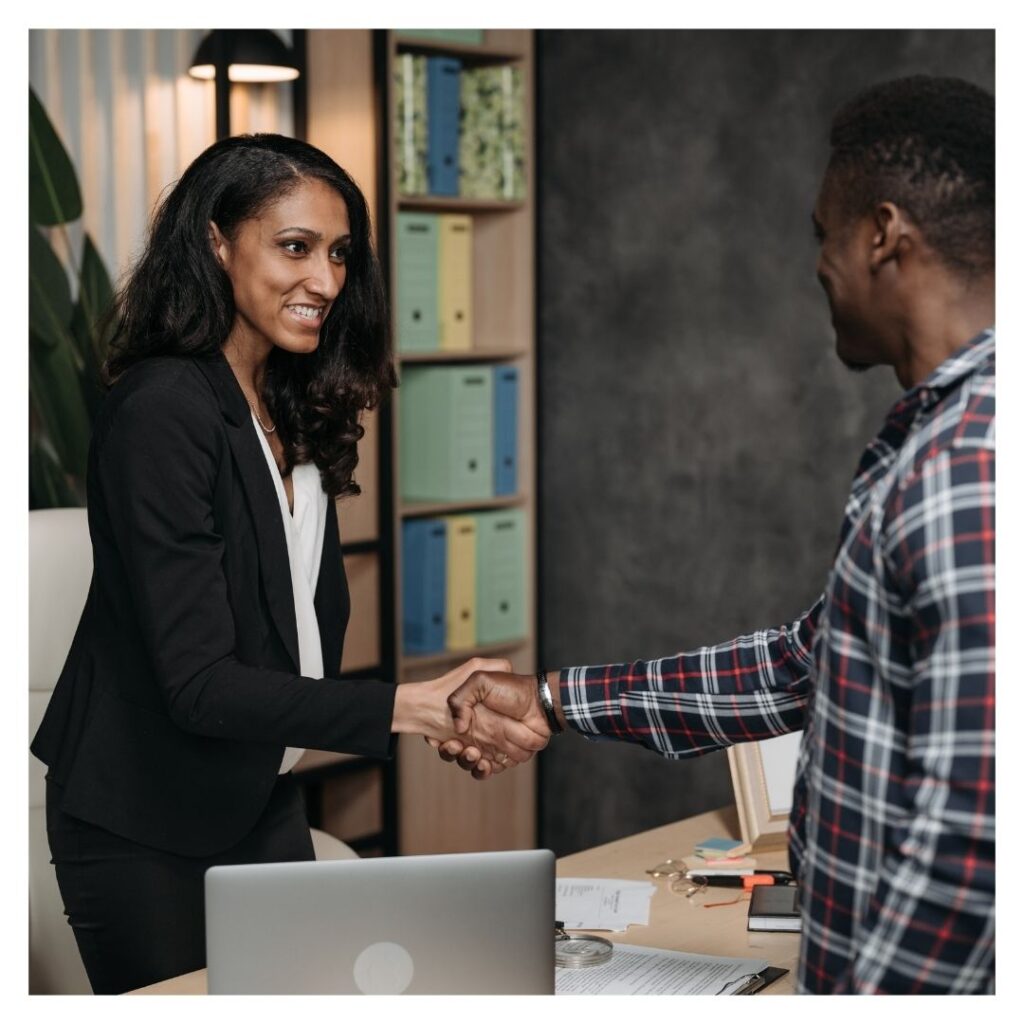 two people shaking hands