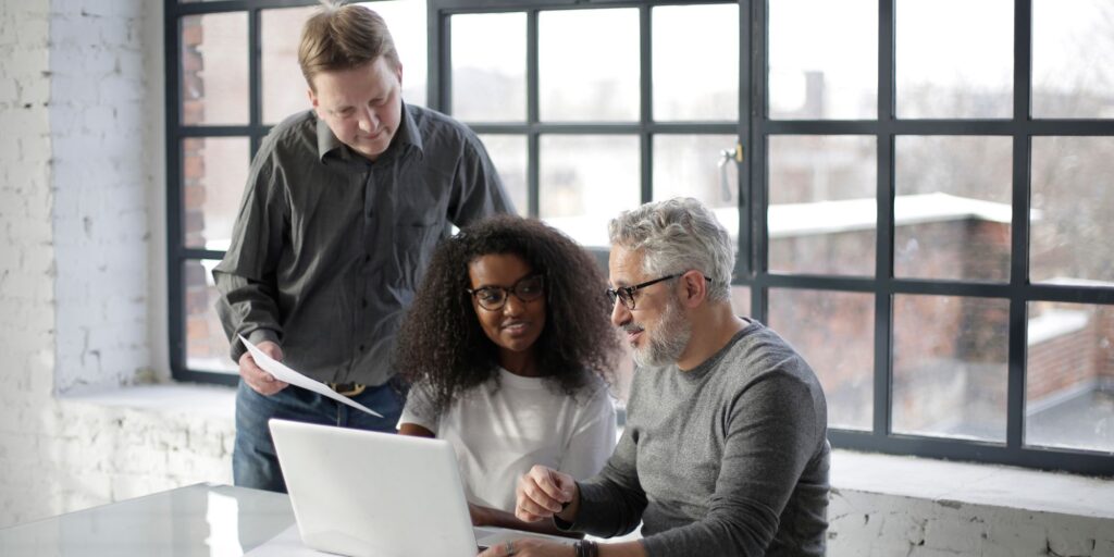 People looking at computer