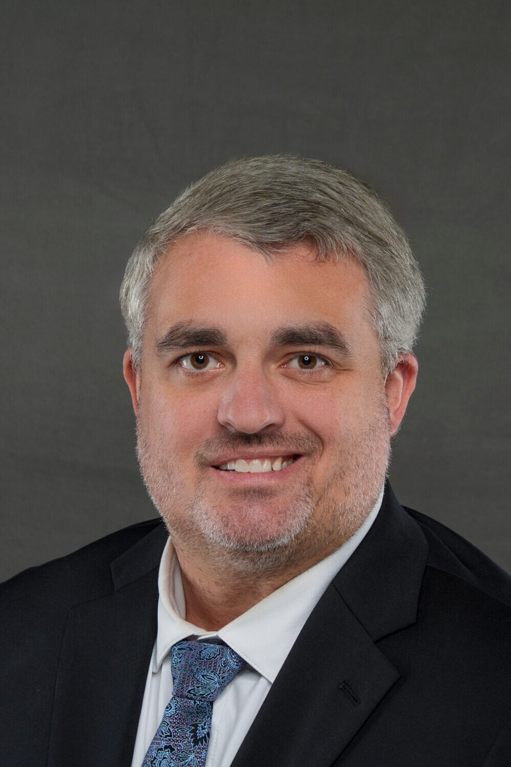 Headshot photograph of Dana Matthews II, a partner with full-service law firm Matthews & Matthews in Destin, Florida.