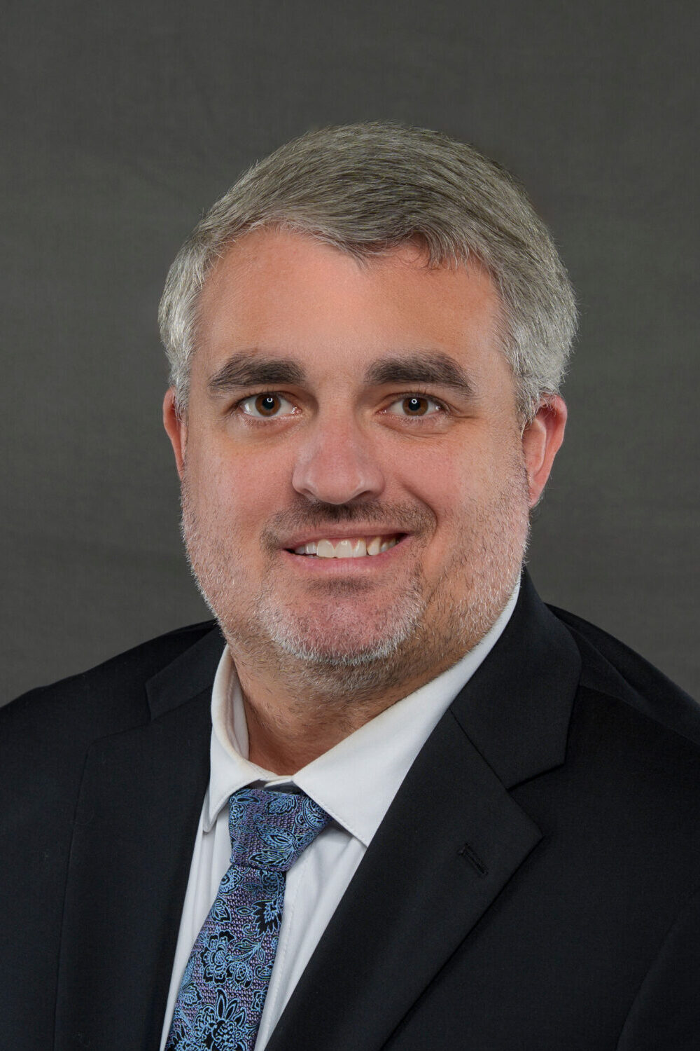 Headshot photograph of Dana Matthews II, a partner with full-service law firm Matthews & Matthews in Destin, Florida.