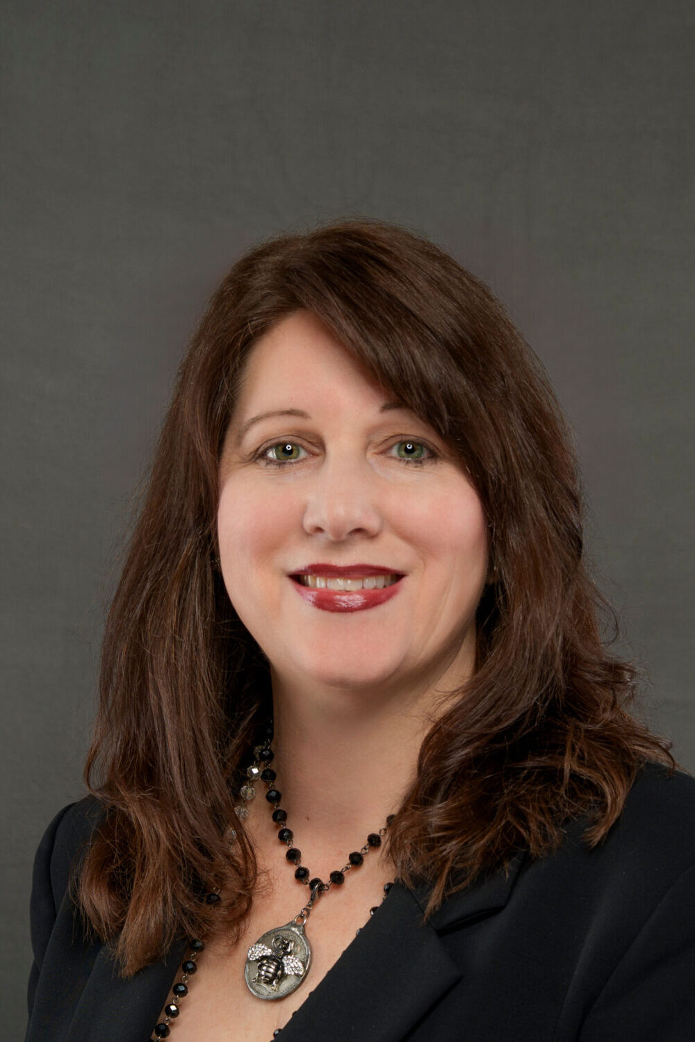 Headshot photograph of Dawn Stuntz, a partner with full-service law firm Matthews & Matthews in Destin, Florida.