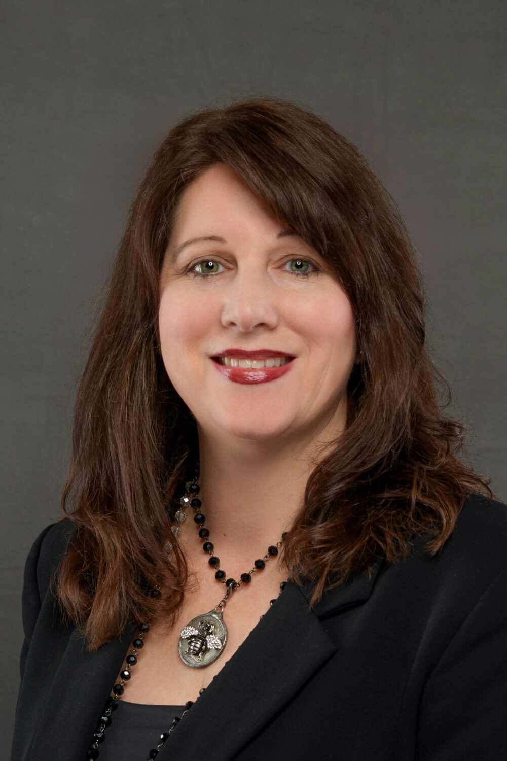 Headshot photograph of Dawn Stuntz, a partner with full-service law firm Matthews & Matthews in Destin, Florida.