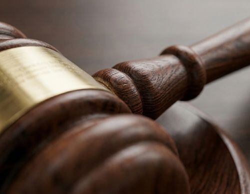Close-up of a wooden judge’s gavel