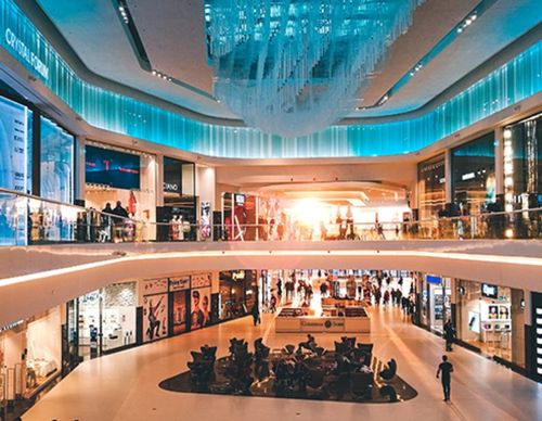 Interior view of a large, modern shopping mall.